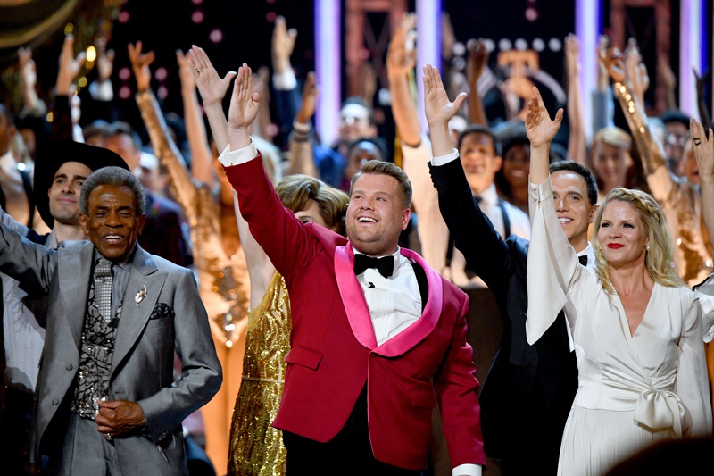Host James Corden (C) performs onstage during the 73rd Annual Tony Awards.